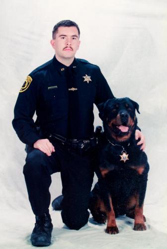 Jamison Burrell pictured with K-9 Luger